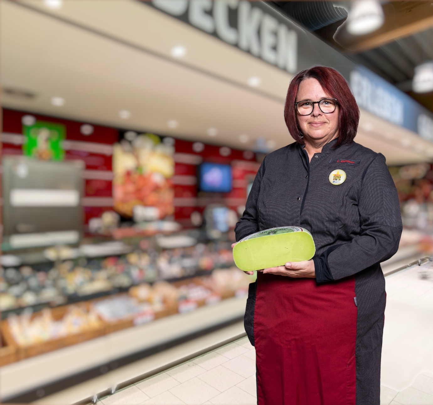 REWE Pfleger Mitarbeiterin Käsetheke